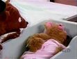 Papa Bear shows Baby Bear his newborn sister