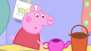 Peppa with a bucket-