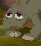 Spike as the Stegosaurus