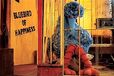 A blue Big Bird sleeps in the cage