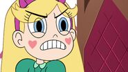 Star Butterfly glaring angrily at Rhombulus