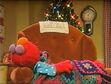 Elmo falls asleep while waiting for Santa Claus