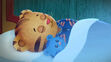 Daniel Tiger sleeping in bed