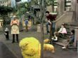 Big Bird sleeping on the sidewalk in episode 181