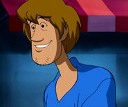 Shaggy Rogers in a blue shirt