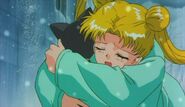 Serena hugging Luna while Luna is crying in Sailor Moon S: The Movie