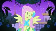 Fluttershy happy because the bird is calling out for her S1E26