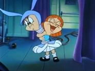 Montana Max in a bunny suit being hugged by Elmyra