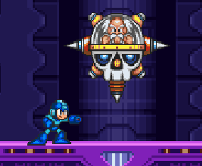 Dr. Wily in front of Mega Man.