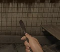 Scalpel equipped in the melee slot.