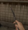 A Lancet equipped in the melee slot.