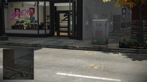 9. On the other side of the fence at the alleyway, next to the barber shop "Shear Hairmony"