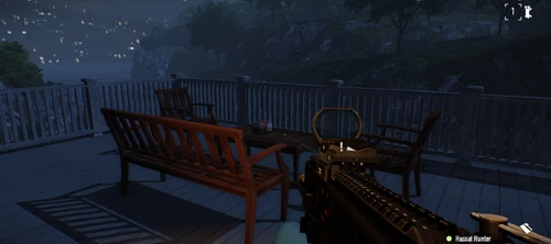 4. On the table of the patio to the left of the house