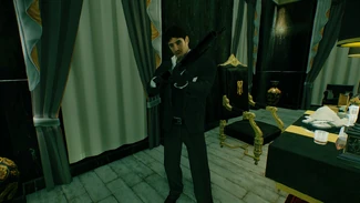 Scarface admiring his rifle.