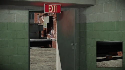 16. Below some pipes, in front of the roof access door near the rear entrance door