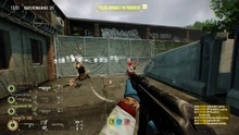 The player damaging enemies behind the fence, seen with WolfHUD's damage popup.