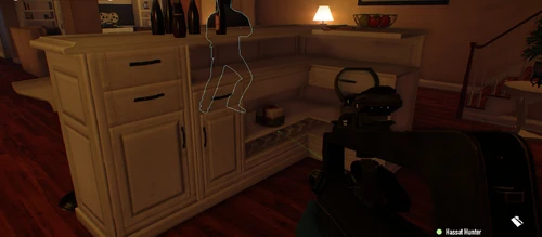 16. Near the stairs to the second level in the back