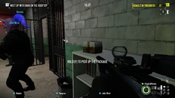 Near the entrance to the room before the electric chair.