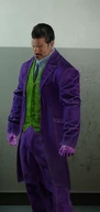 Dallas in The Showman | Disturbing Violet outfit.