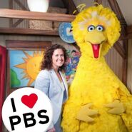 Betsy Oliphant with Big Bird in The Sunshine Barn.