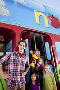 Sean Roach and Noodle McNoodle with a few kids.