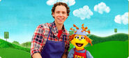 Sean and Noodle in a Sprout backdrop.