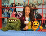 Oscar the Grouch with Kaitlin and Chica.