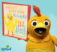 Chica wishes Big Bird a happy birthday.