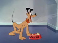 Pluto in "Out of the Frying Pan and Into the Firing Line"