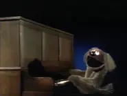 Ralph playing a piano.