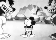 Mickey has a close encounter with the lion and the bear.