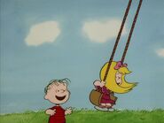 Linus is delighted to see Janice on the swings with her hair grown back longer than before