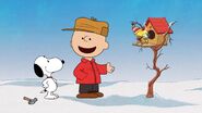 Charlie Brown is happy to know that Snoopy builds a birdhouse for Woodstock