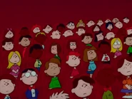 Peppermint Patty and Marcie and the children all stand up for Hallelujah Chorus during the performance.png (922 KB)