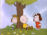 Marcie taking off her glasses, and winking at Charlie Brown, in You're the Greatest, Charlie Brown.