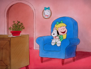 Lila cuddles with Snoopy in Snoopy's Reunion.