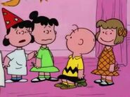 Charlie Brown and the girls at the Halloween party