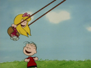 Linus happily sees Janice on the swings with her longer hair as she swings happily