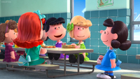 Heather sitting at the cafeteria table with Violet, Lucy, and Patty Swanson