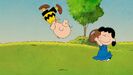 Lucy pulls football away from Charlie Brown as he fell