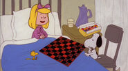 Lila playing checkers with Snoopy and Woodstock