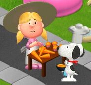 Mimi making carrot cupcakes with Snoopy