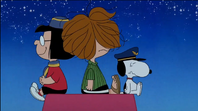 Peppermint Patty's hair messed up after rough landing while Snoopy feels dizzy and is about to pass out