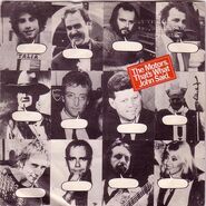 Second from the right, top row, along with some other famous Johns, on the Motors' 7 inch That's What John Said (Virgin, 1980).