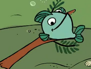 Green fish sitting in a "tree"