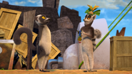 Hector receiving an award from King Julien XIII of Madagascar.