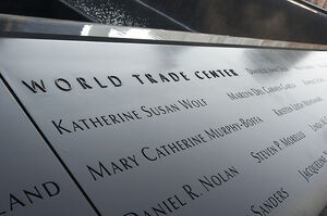 800px-A section of the 9-11 Memorial lists those who lost their lives in the World Trade Center attacks, in New York, N.Y., Nov