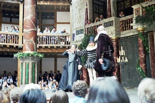 The Comedy of Errors performed at the Globe Theatre, London, 2002. Photo by Ester Inbar.,  Courtesy Wikimedia Commons.