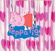 Peppa Lyes Down on The Peppa Pig Logo
