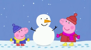 Peppa and George with their snowman